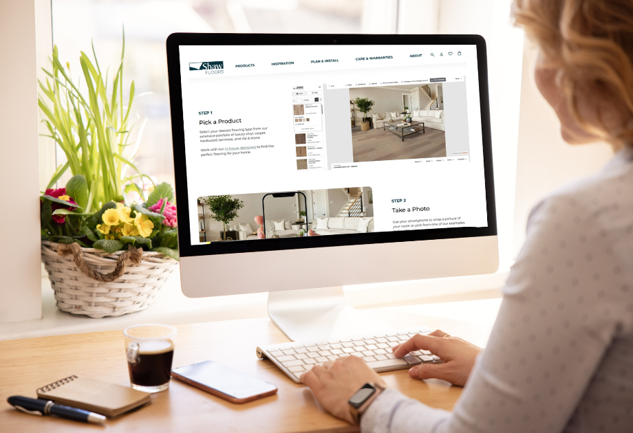 woman using computer to look up flooring products